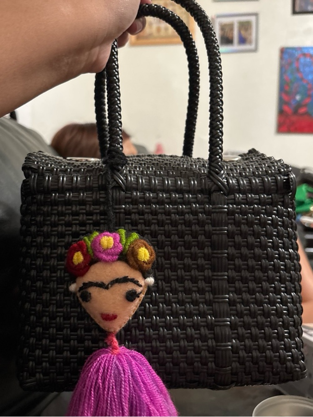 Woven Black Top-Handle Tote with Pink Tassel Charm